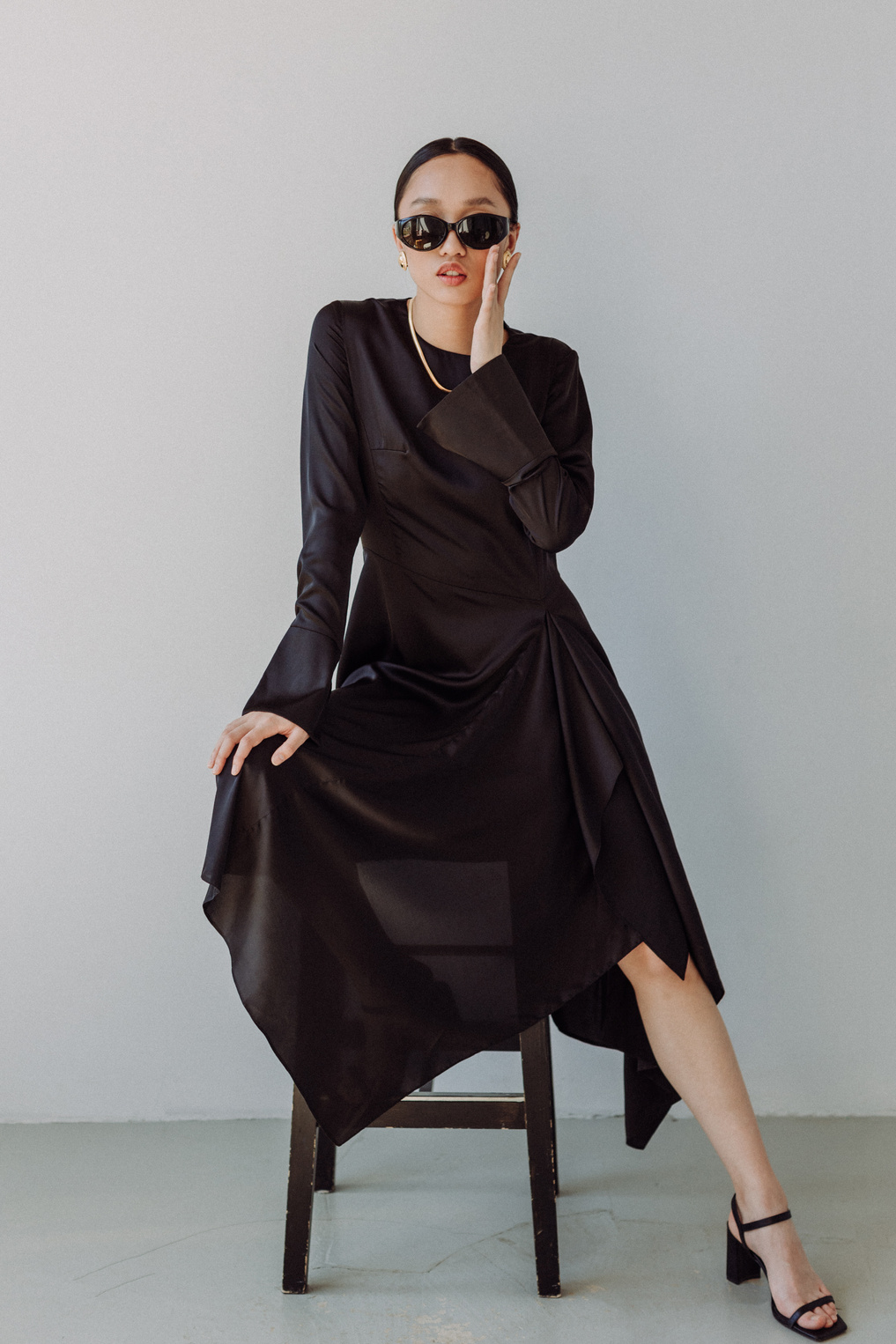 Woman in Black Dress with Sunglasses